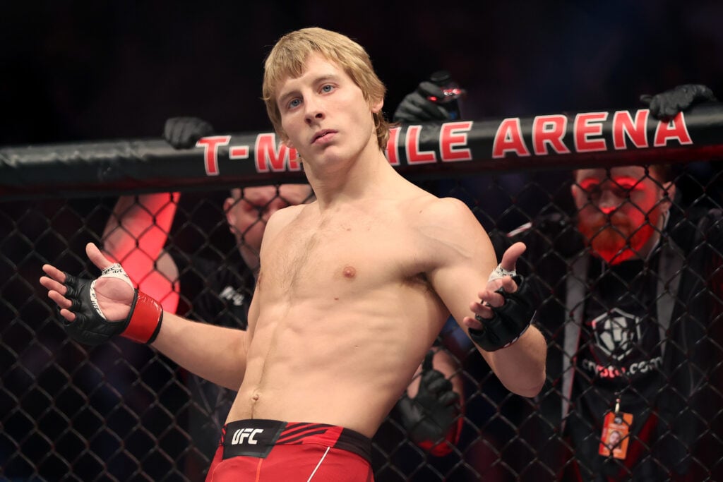 Paddy Pimblett gestures during his introduction at UFC 282.