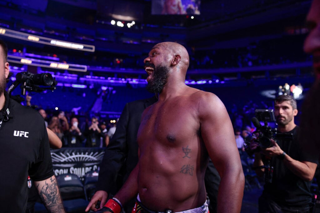 Jon Jones leaves the cage after UFC 309 win
