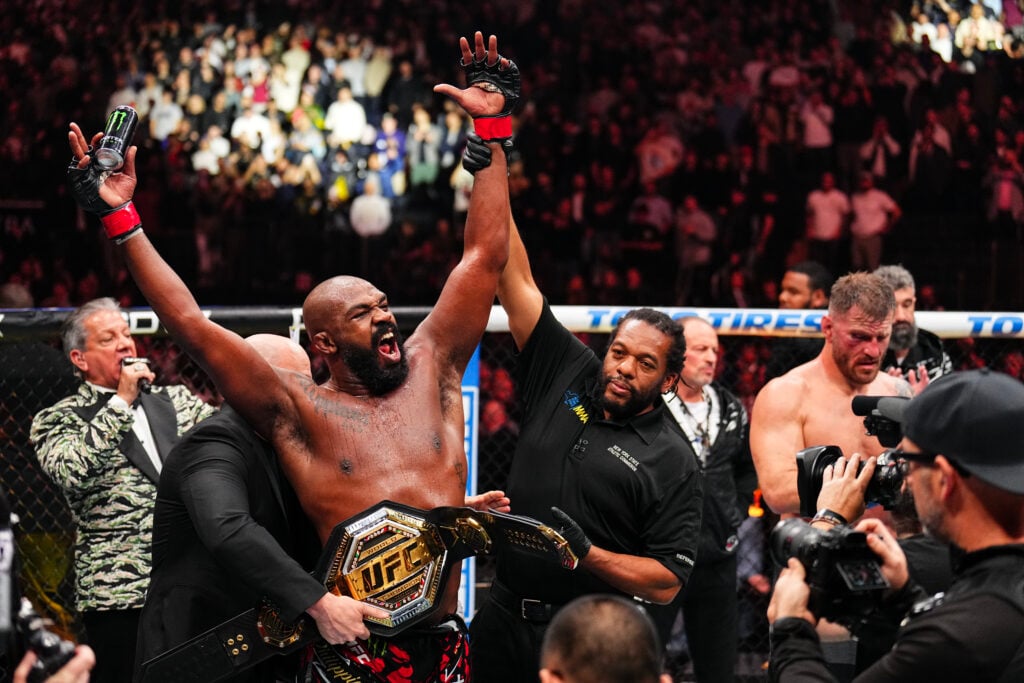 Jon Jones celebrates after knocking out Stipe Miocic at UFC 309