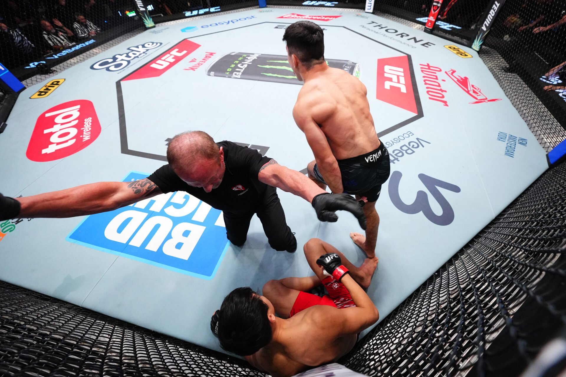 Kevin Vallejos celebrates after finishing his opponent at UFC Vegas 104.