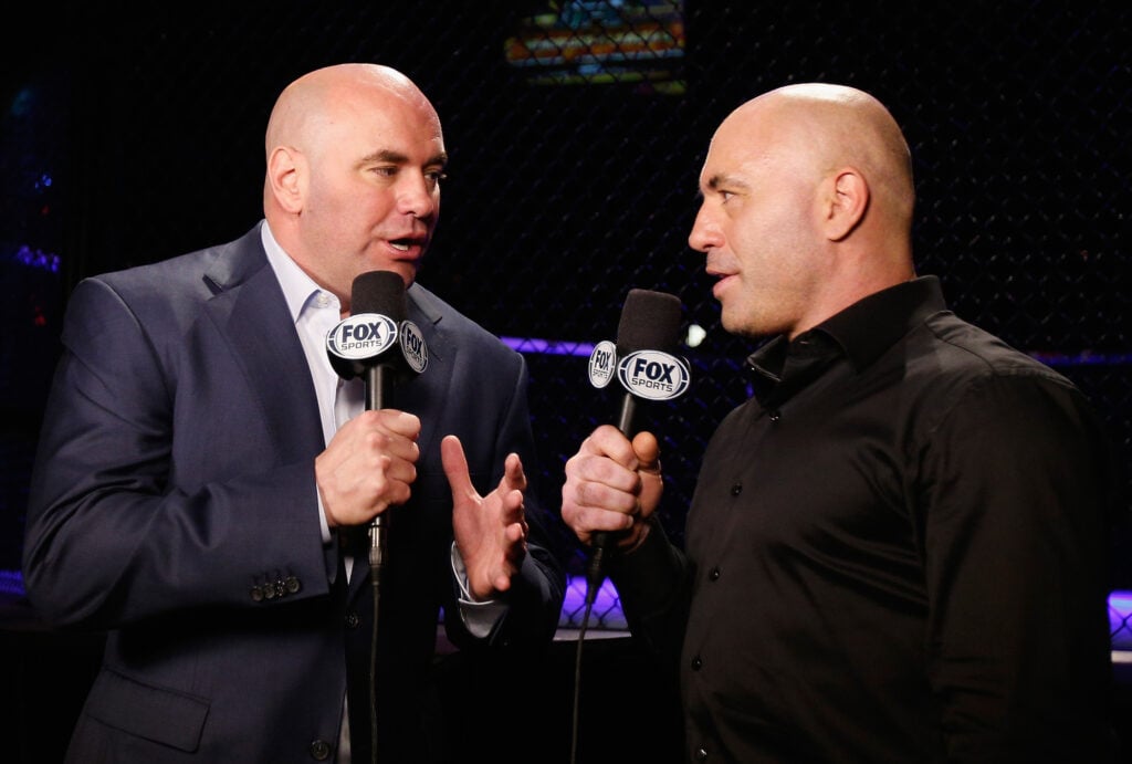 Dana White and Joe Rogan talk during the UFC 281 broadcast.