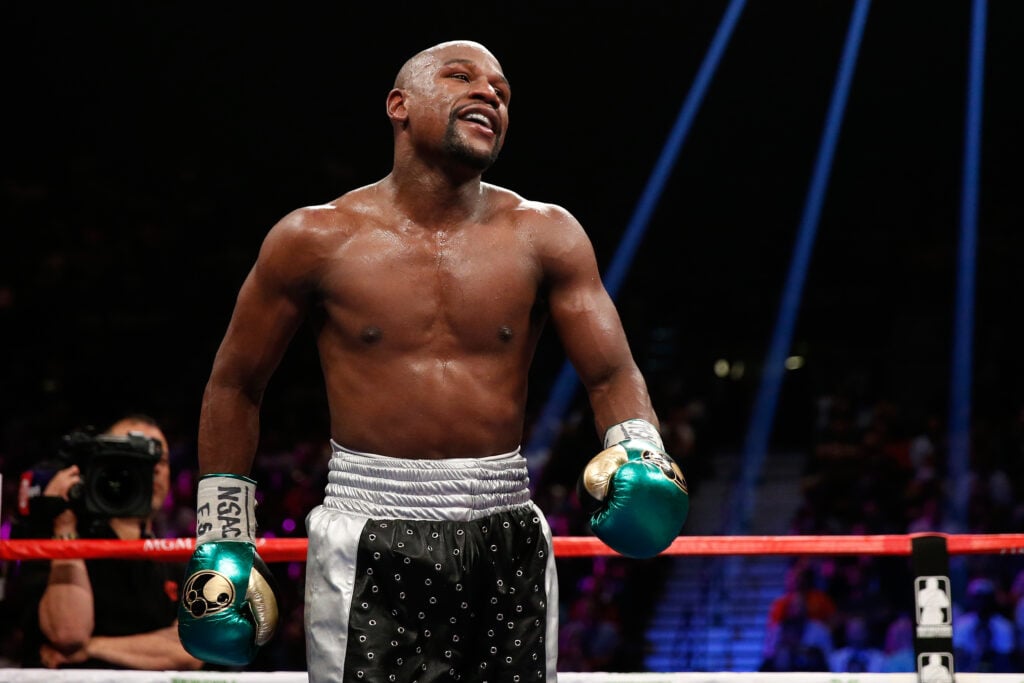 Floyd Mayweather Jr. walks in the ring during his WBC/WBA welterweight title fight against Andre Berto