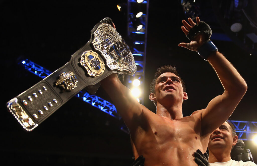 Image of Dominick Cruz as he leaves the cage after defeating TJ Dillashaw at UFC Fight Night: Boston.