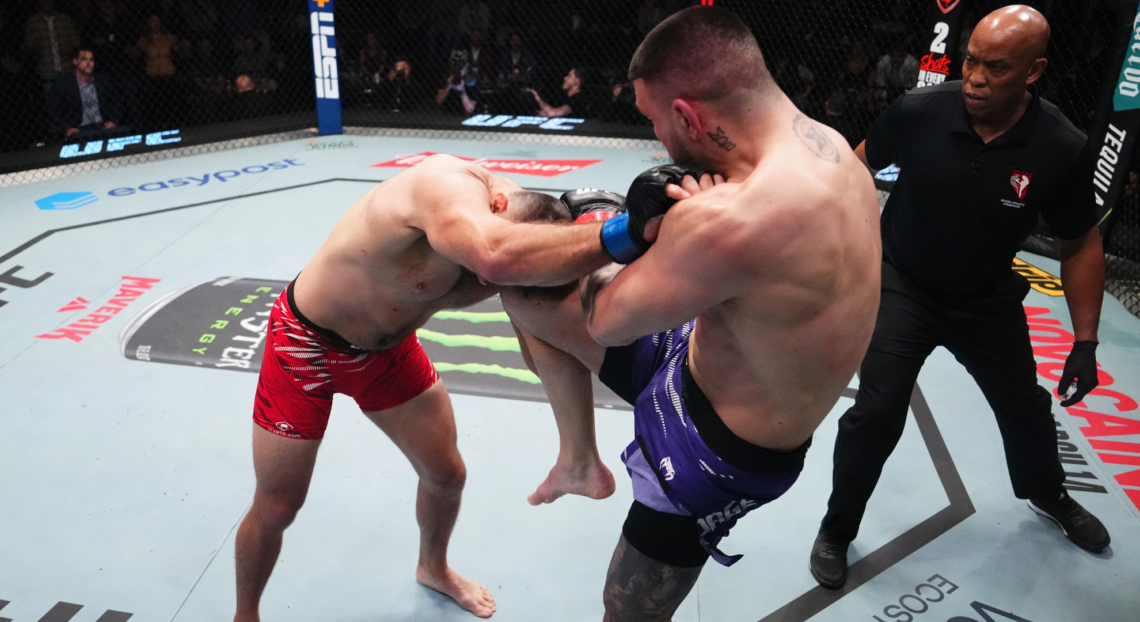 Cody Brundage knees Julian Marquez during their fight at UFC Vegas 103.