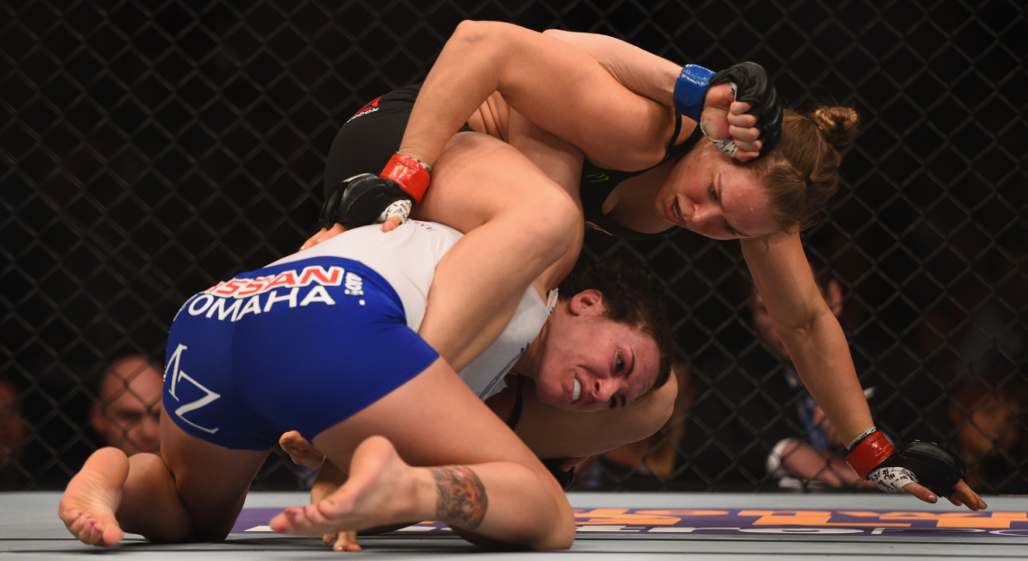 Ronda Rousey and Cat Zingano grapple at UFC 184.