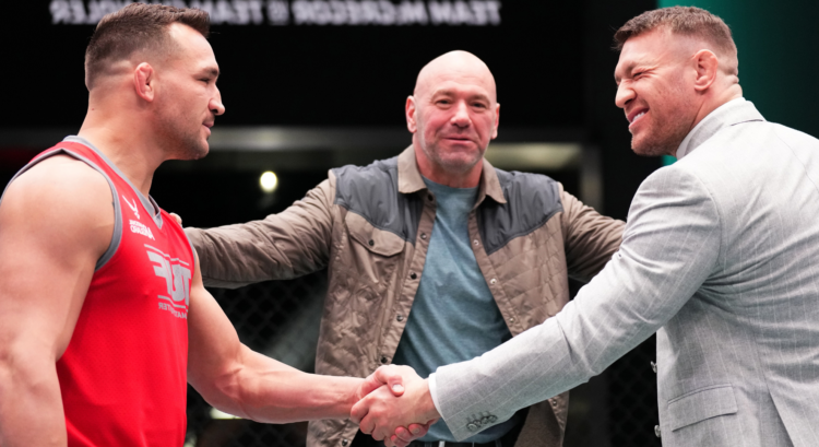 Michael Chandler and Conor McGregor shake hands on the set of The Ultimate Fighter 31