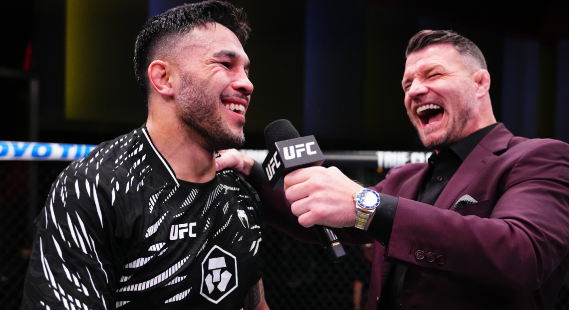Brad Tavares speaks with Michael Bisping after a win at UFC Vegas 105.