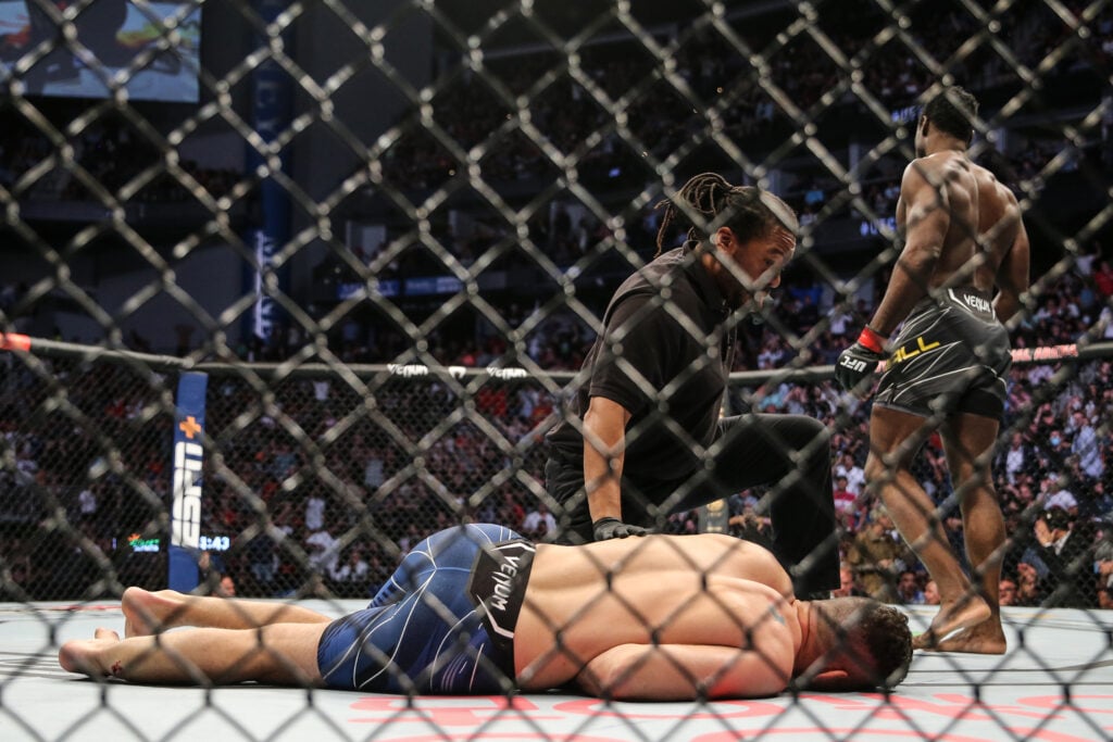 Uriah Hall walks away after Chris Weidman suffers leg break at UFC 261