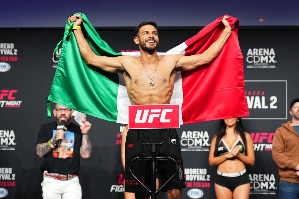 Yair Rodriguez poses on the scales ahead of UFC Mexico City