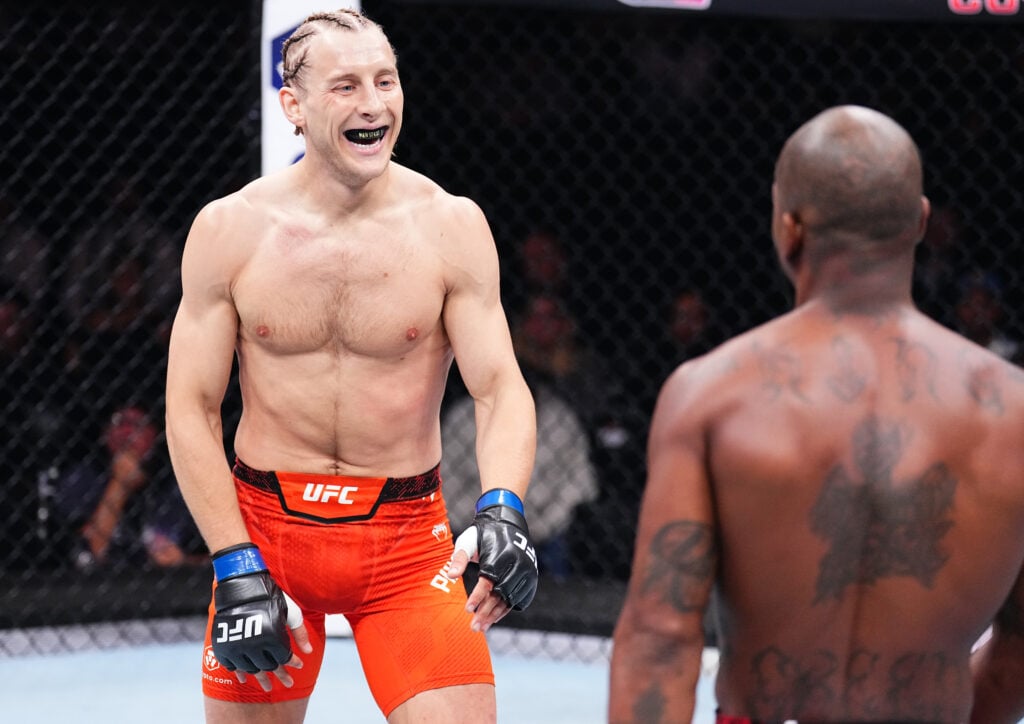 Paddy Pimblett smiles during his fight with King Green