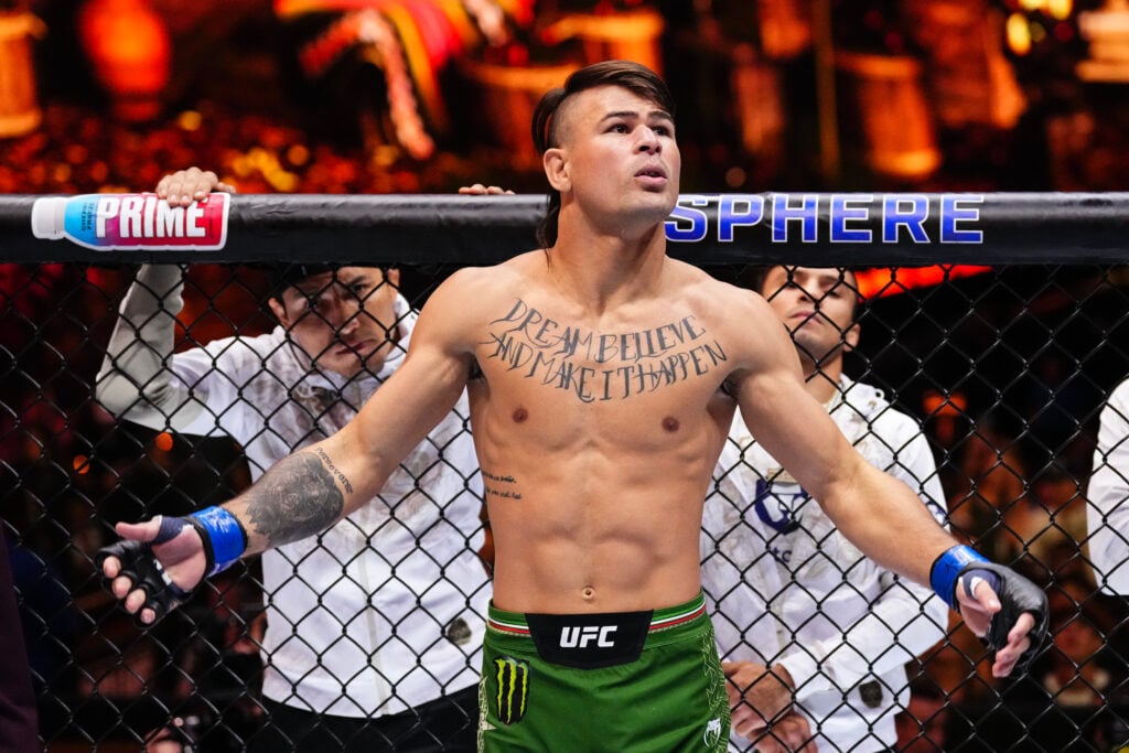 Diego Lopes walks out at UFC 306.