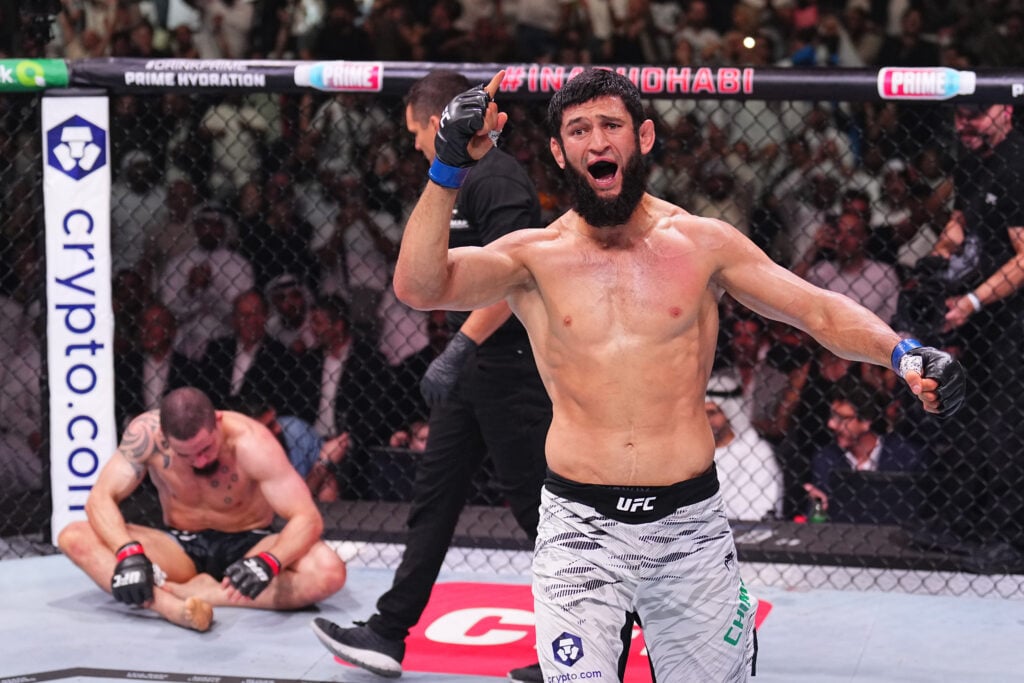 Khamzat Chimaev celebrates after finishing Robert Whittaker at UFC 308