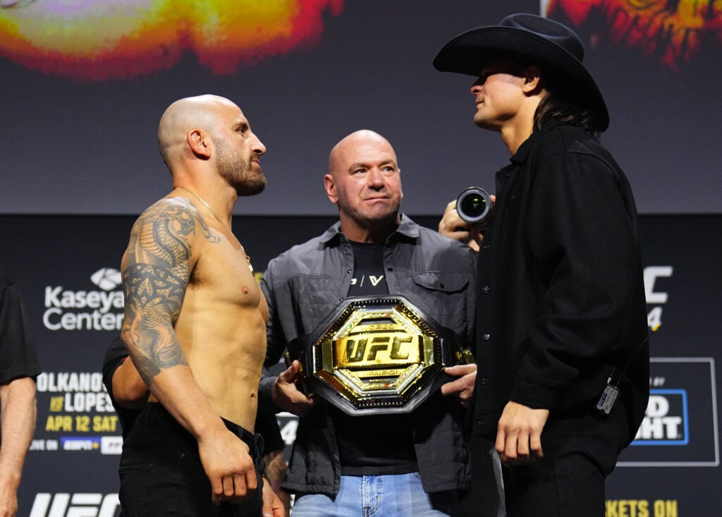 Alexander Volkanovski and Diego Lopes face off at a press conference.