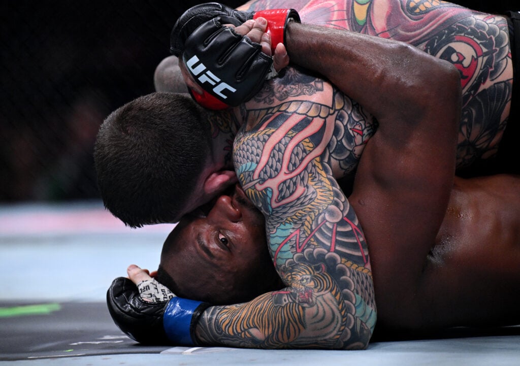Leon Edwards grapples with Sean Brady at UFC London.
