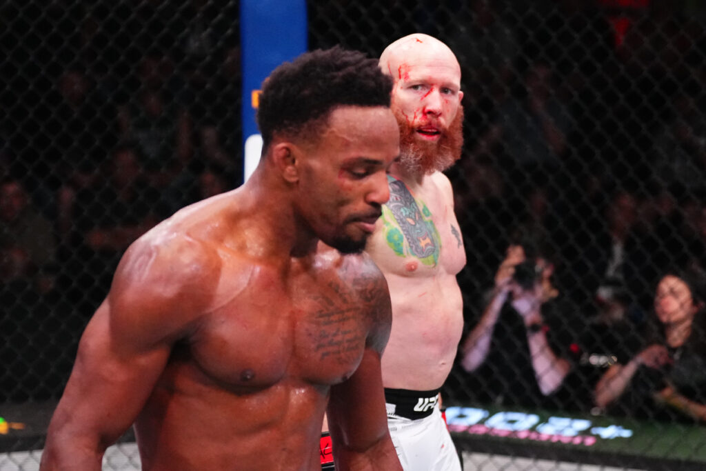 Josh Emmett stares down Lerone Murphy in between rounds at UFC Vegas 105.