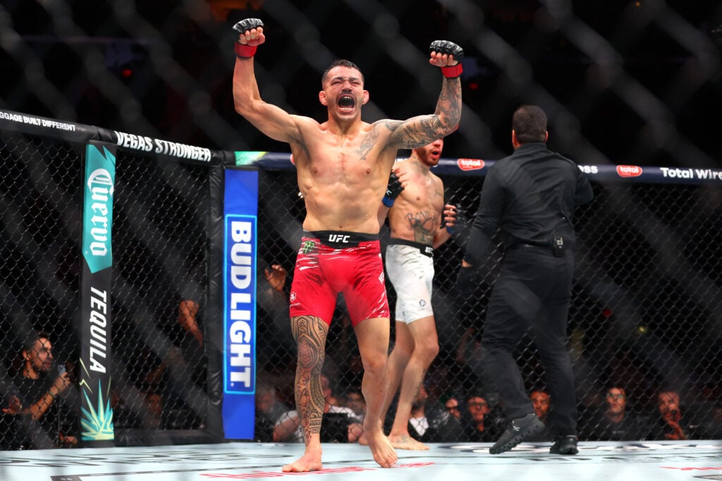 Dan Ige celebrates after beating Sean Woodson at UFC 314