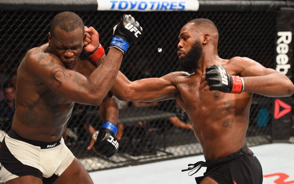 Jon Jones lands punches on Ovince Saint Preux during UFC 197