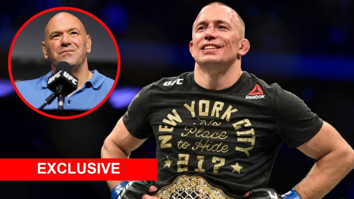 Georges St-Pierre celebrates after beating Michael Bisping at UFC 217 with an inset of Dana White at the UFC 299 press conference