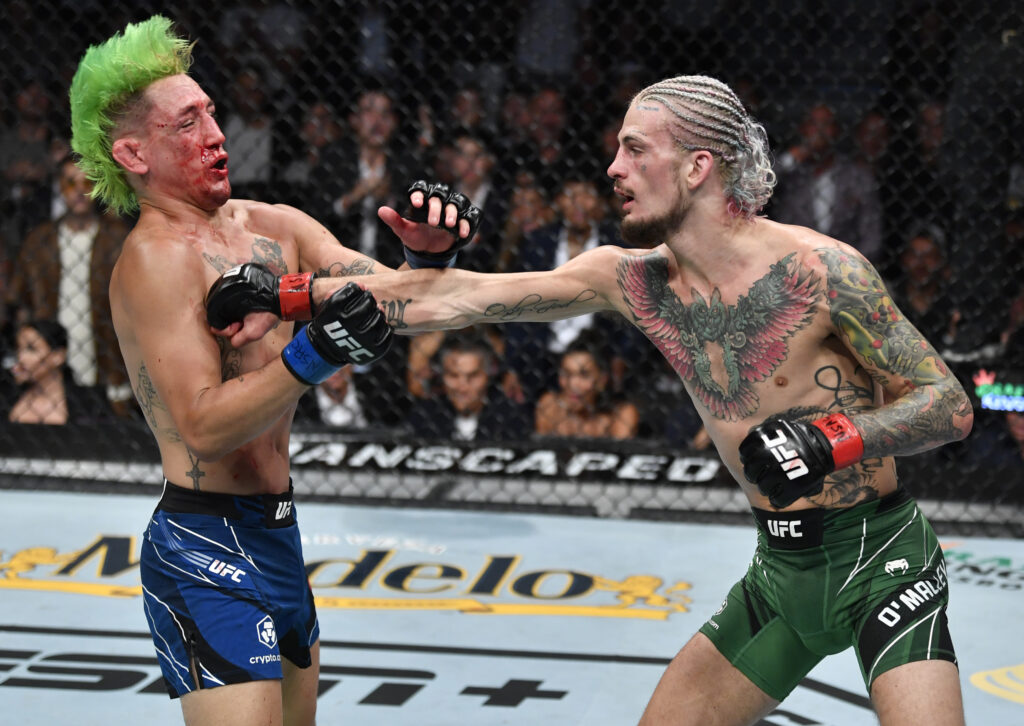 Sean O'Malley punches Kris Moutinho at UFC 264