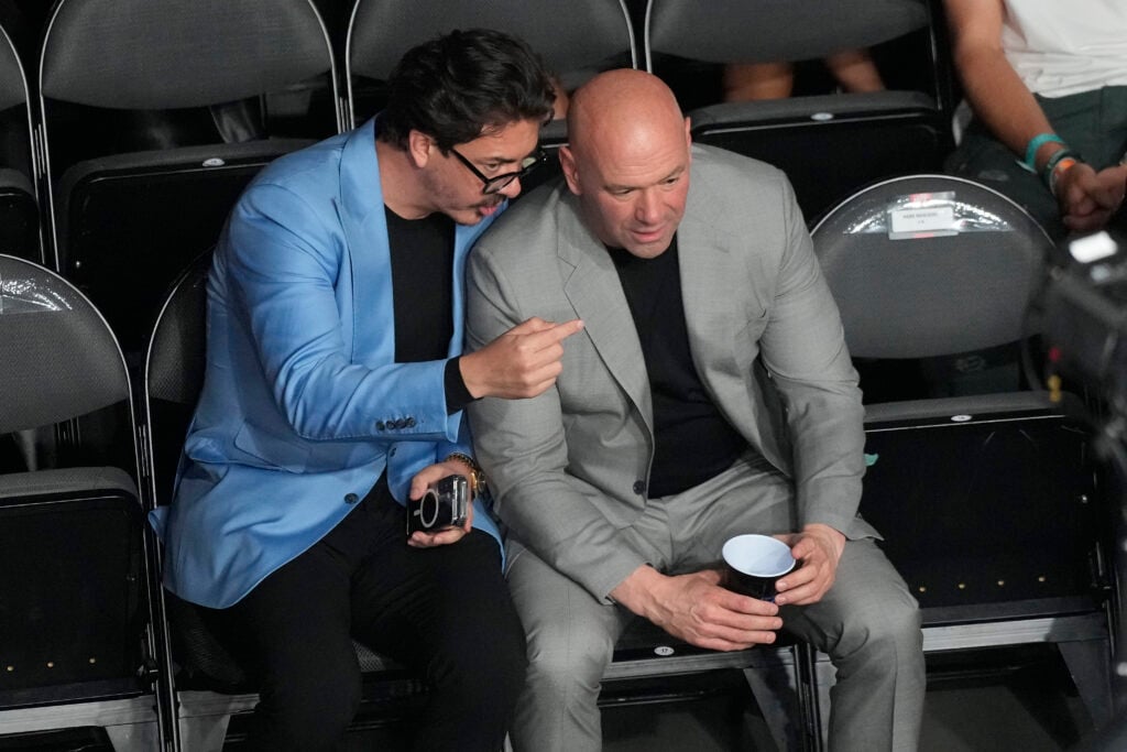 Dana White speaks to Hunter Campbell cageside at UFC 303