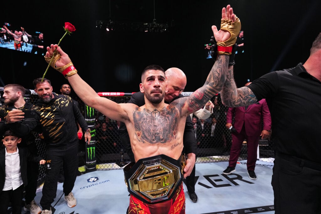 Ilia Topuria celebrates his victory over Max Holloway at UFC 308.