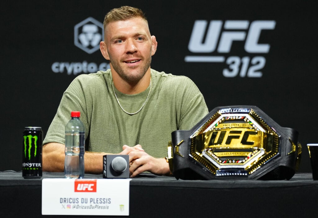 Dricus du Plessis answers a question during the UFC 312 pre-fight press conference