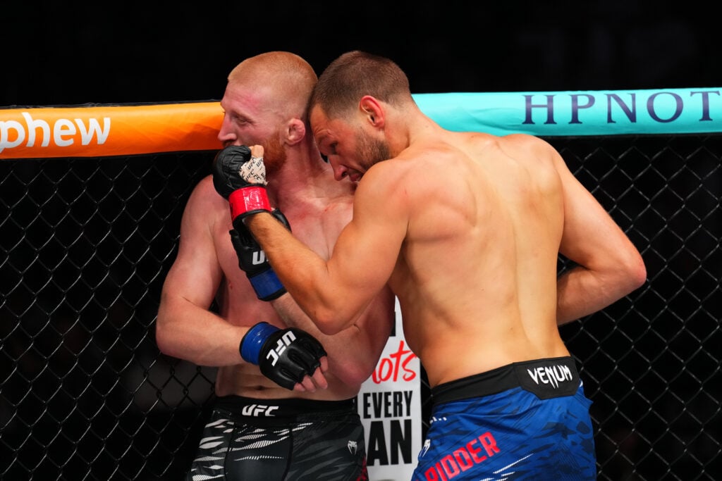 Bo Nickal takes a punch from Reinier De Ridder at UFC Des Moines