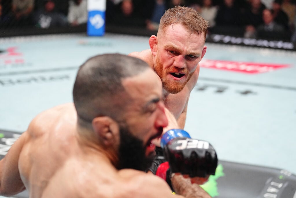 Jack Della Maddalena punches Belal Muhammad at UFC 315