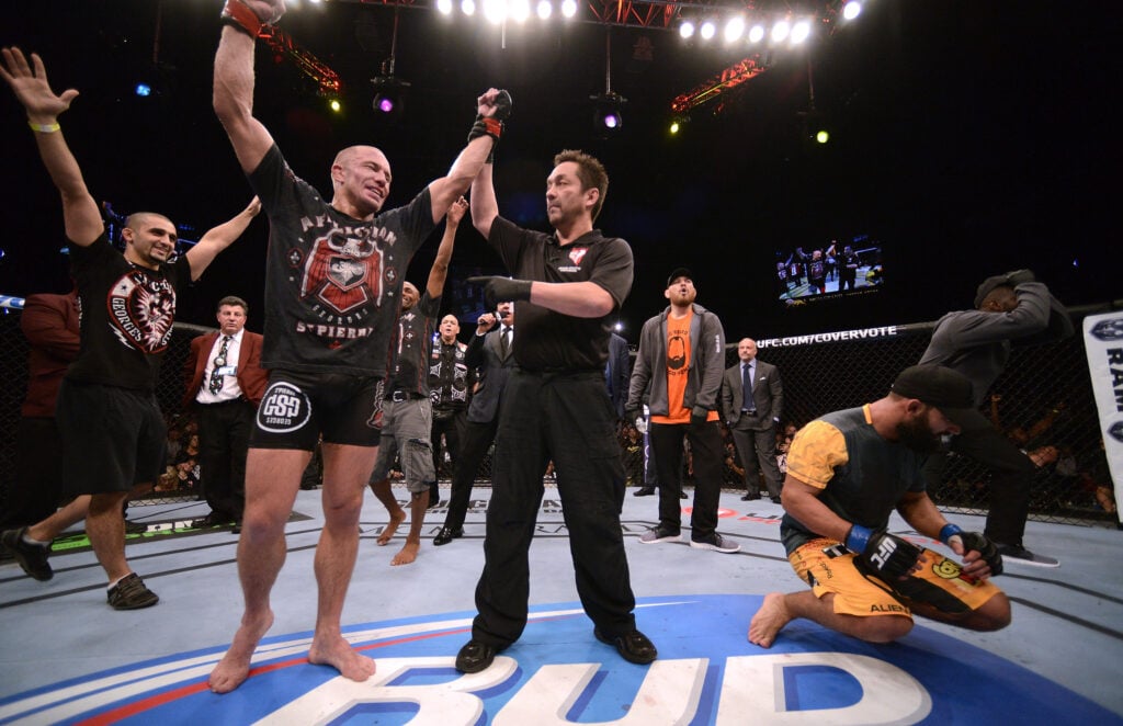 Georges St-Pierre celebrates his UFC 167 win against Johnny Hendricks