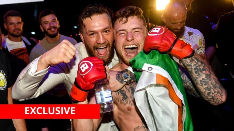 James Gallagher celebrates with Conor McGregor after Bellator win with exclusive banner