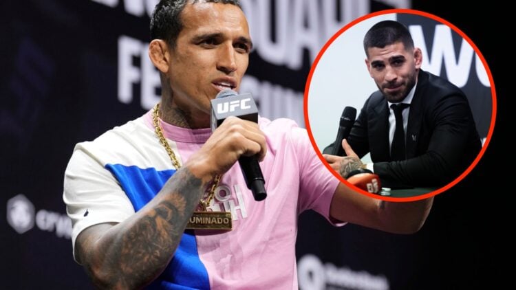 Charles Oliveira answers questions at the UFC 312 ceremonial weigh-ins with an inset of Ilia Topuria at WOW 17