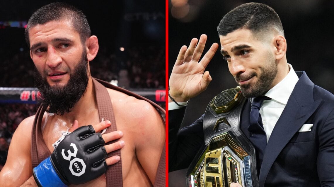 Khamzat Chimaev reacts after beating Kamaru Usman at UFC 294 with Ilia Topuria in attendance at the LaLiga EA Sports match between Real Madrid CF a...