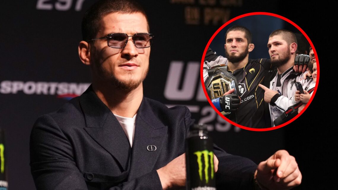 Movsar Evloev on stage at the UFC 297 press conference with an inset of Islam Makhachev and Khabib Nurmagomedov celebrating and posing at UFC 280