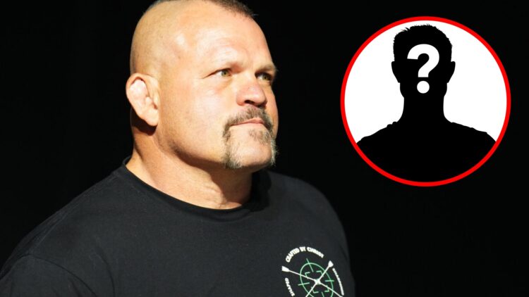 Chuck Liddell walks on stage for a Q&A session at the UFC 290 ceremonial weigh-ins with an inset of a mystery icon