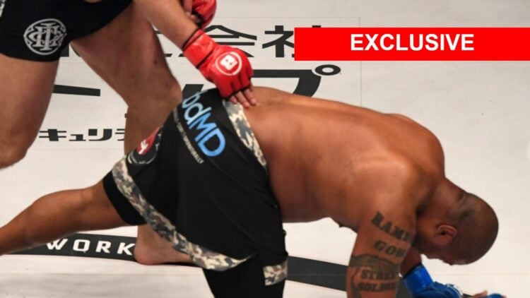 Image of Quinton 'Rampage Jackson falling to the floor after being knocked out by Fedor Emelianenko