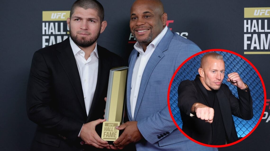 Khabib Nurmagomedov and Daniel Cormier pose at the UFC Hall of Fame Class of 2022 Induction Ceremony with an inset of Georges St-Pierre posing at t...