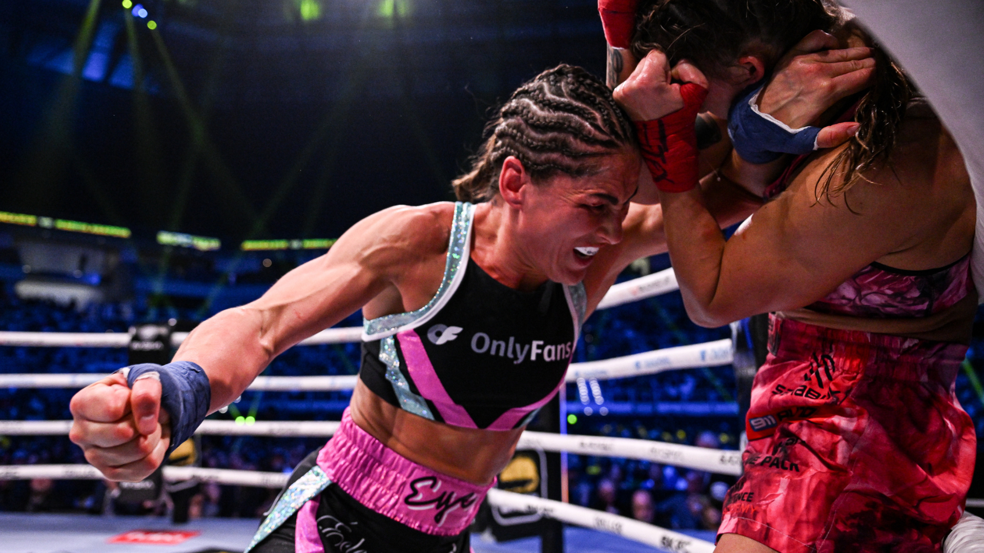 Image of Jessica Eye punching Mariya Agapova at BKFC Texas