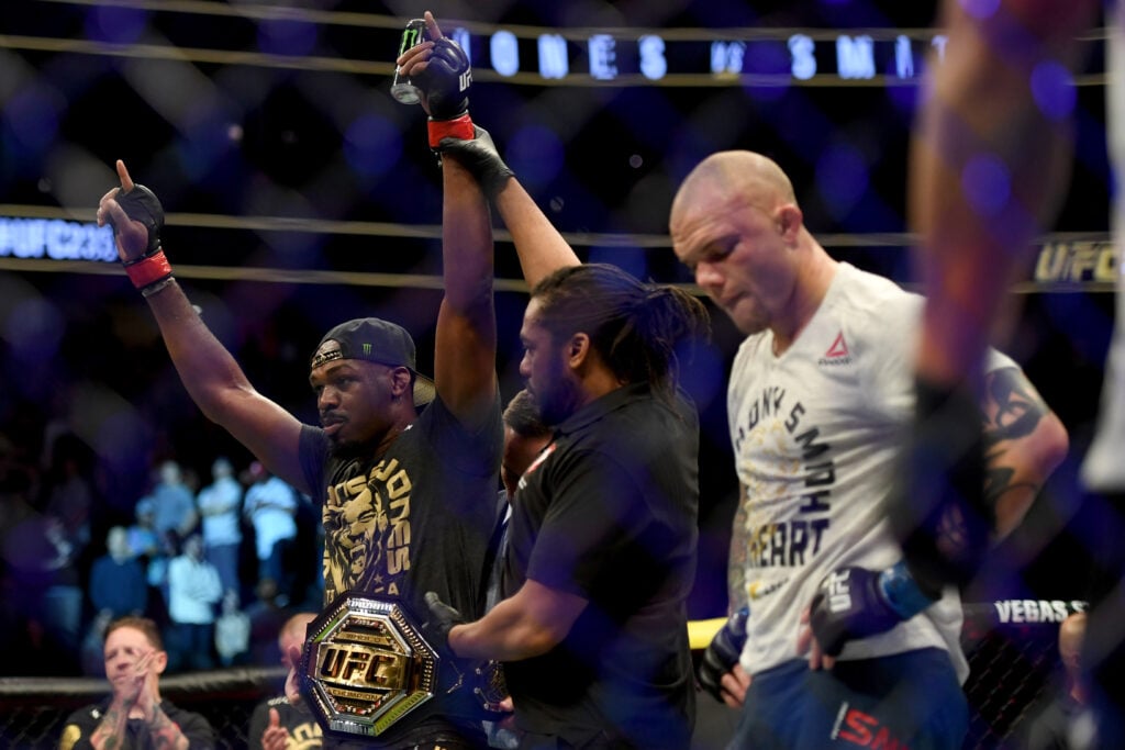 Jon Jones celebrates after beating Anthony Smith in their title fight at UFC 235.