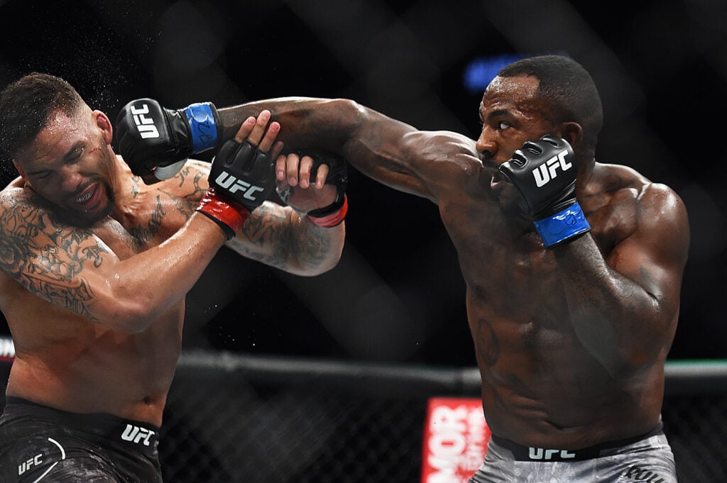 Khalil Rountree Jr. jabs Eryk Anders during their fight at UFC 236