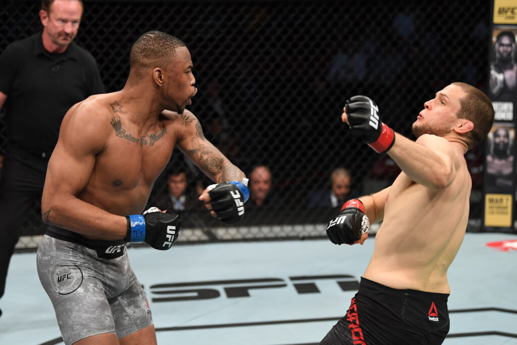 Khaos Williams punches Alex Morono during their UFC 247 fight