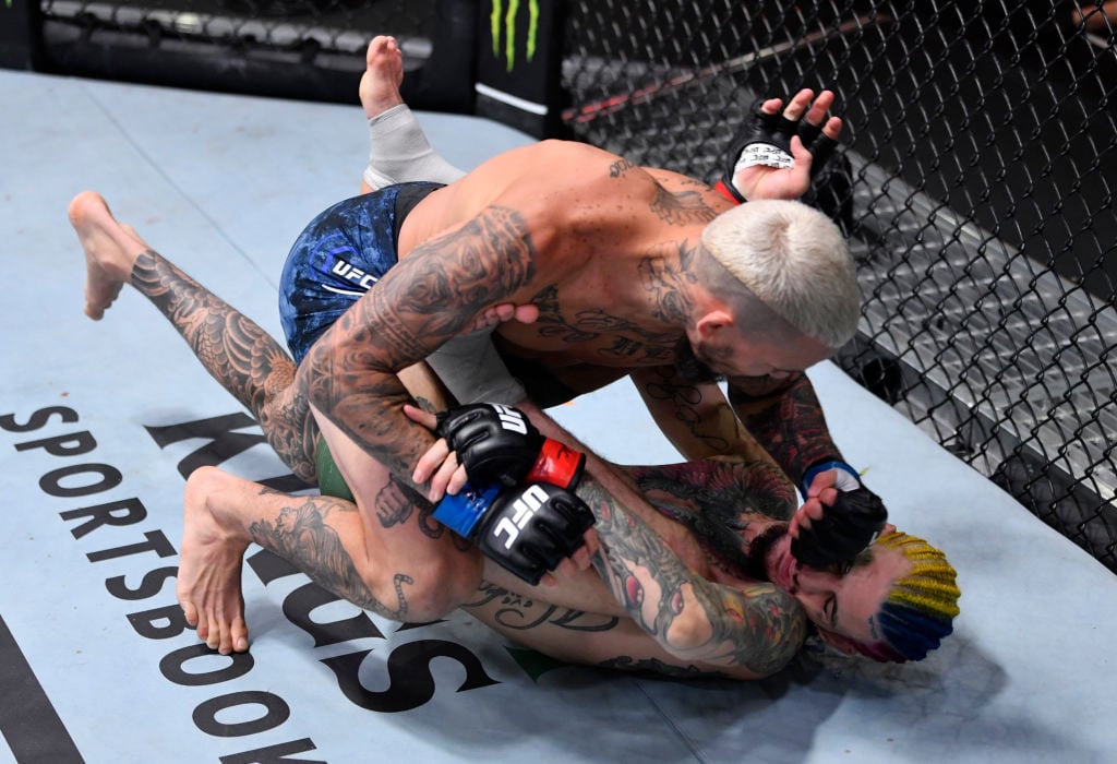 Marlon Vera lands elbows on Sean O'Malley during UFC 252 fight