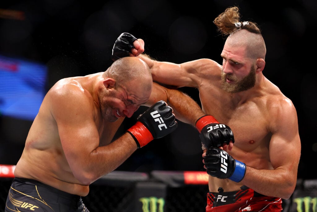 Jiri Prochazka and Glover Teixeira trade punches during their title fight at UFC 275