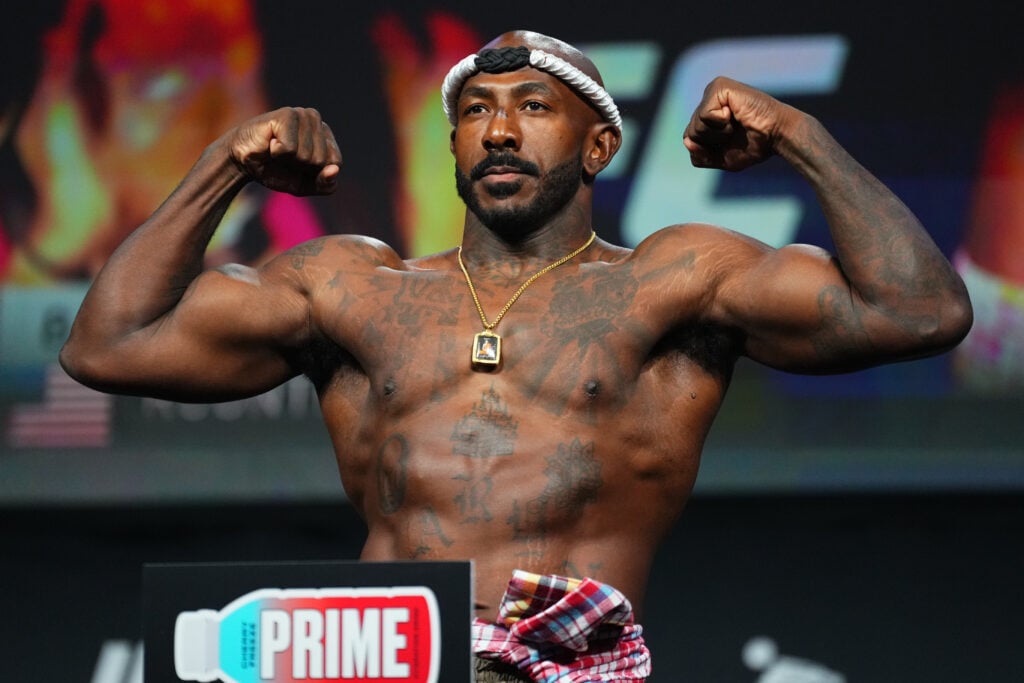 Khalil Rountree Jr. poses on the scale during the UFC 307