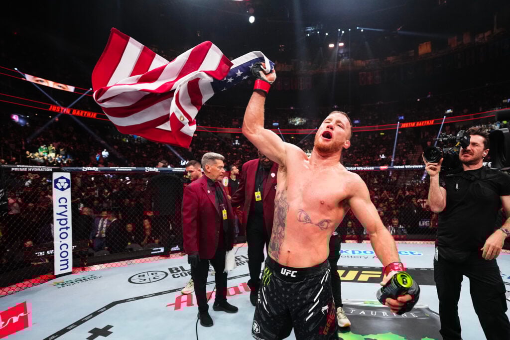 Justin Gaethje celebrates his UFC 313 win over Rafael Fiziev