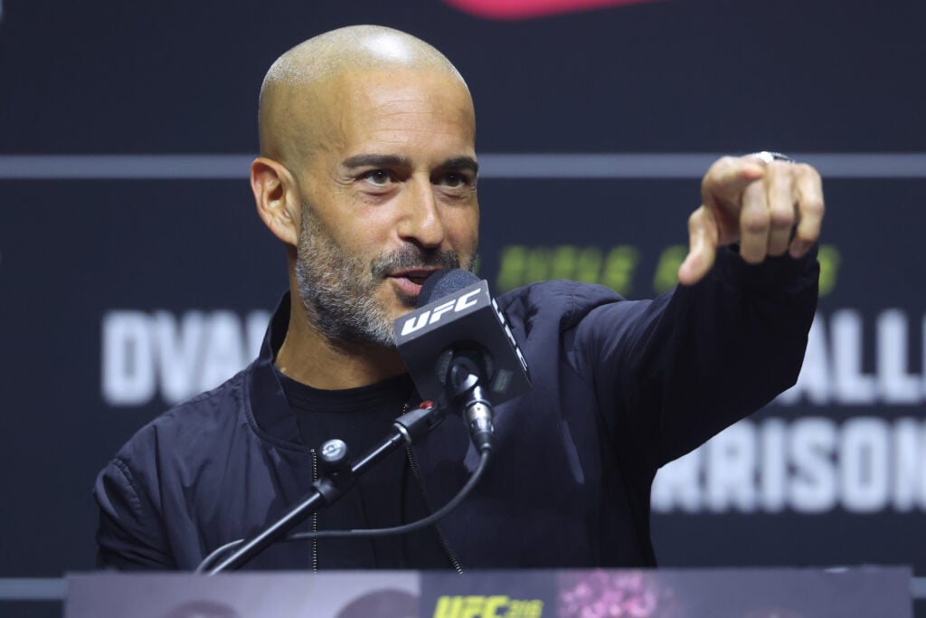 Jon Anik addresses the media during the UFC 316 pre-fight press conference