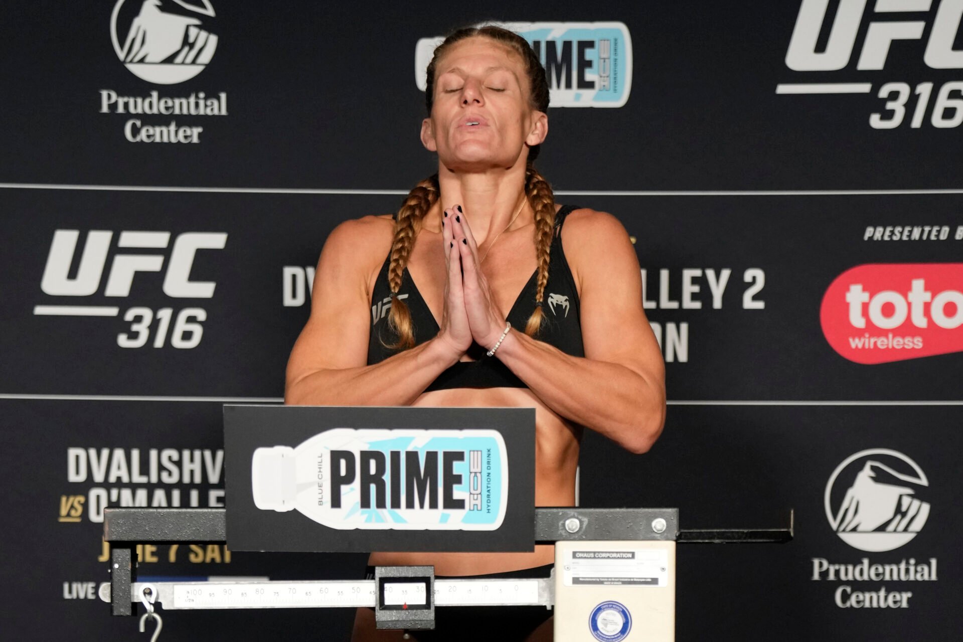 Kayla Harrison on the scales during UFC 316 weigh-ins