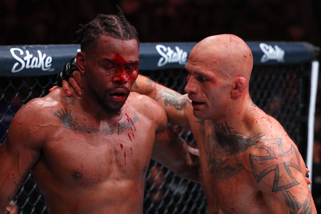 Andreas Gustafsson speaks with opponent Khaos Williams after their fight at UFC 316