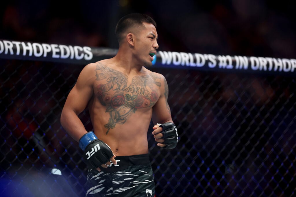 Joshua Van stares down his opponent Bruno Silva as they prepare to fight at UFC 316