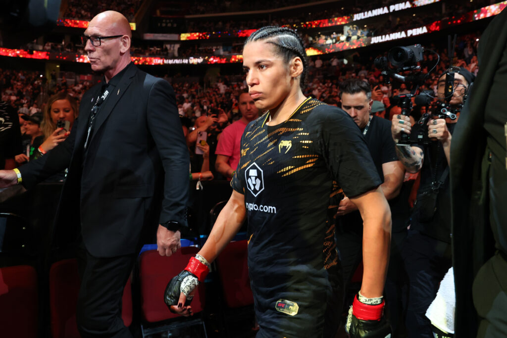 Julianna Pena walks to the Octagon for her title fight against Kayla Harrison at UFC 316.