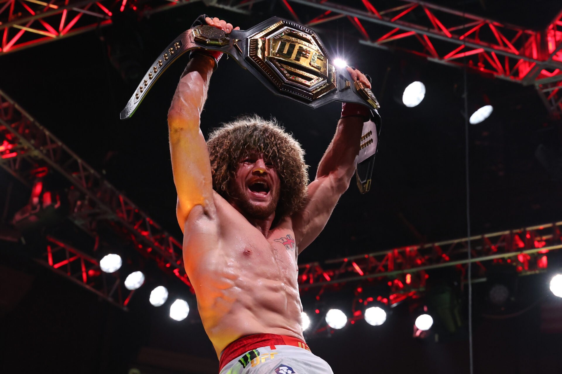 Merab Dvalishvili celebrates his UFC 316 win
